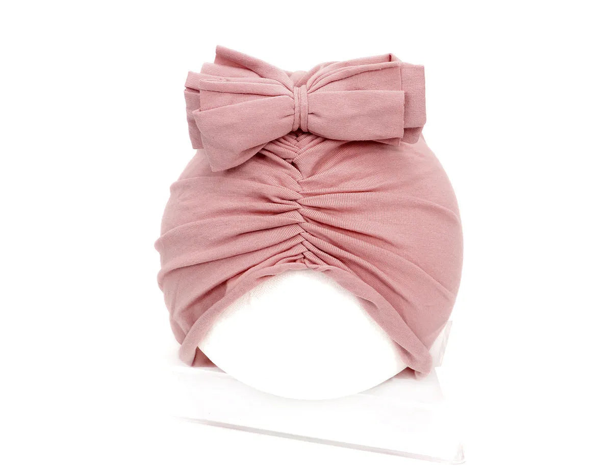 Soft knitted acrylic baby girl turban hat in solid colour, fits head sizes 35-48cm for ages 0-28 months