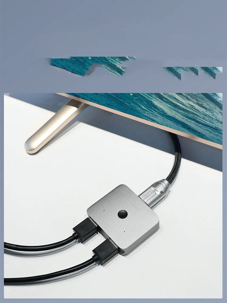 Grey Haibeisi HDMI 1.2 switcher device for splitting one video source to two monitors or TVs.