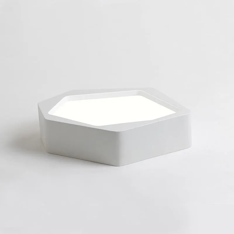 Geometric shaped LED wall light with asymmetric iron frame in black or white colour options