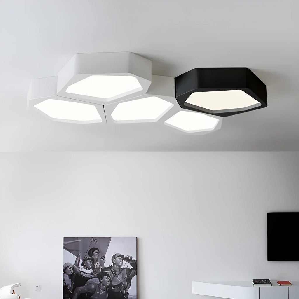 Geometric shaped LED wall light with asymmetric iron frame in black or white colour options