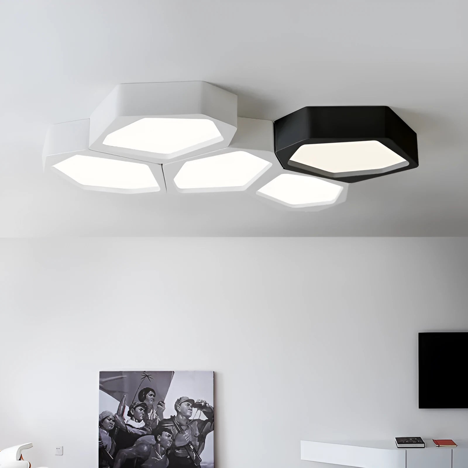 Geometric shaped LED wall light with asymmetric iron frame in black or white colour options