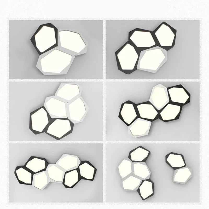 Geometric shaped LED wall light with asymmetric iron frame in black or white colour options