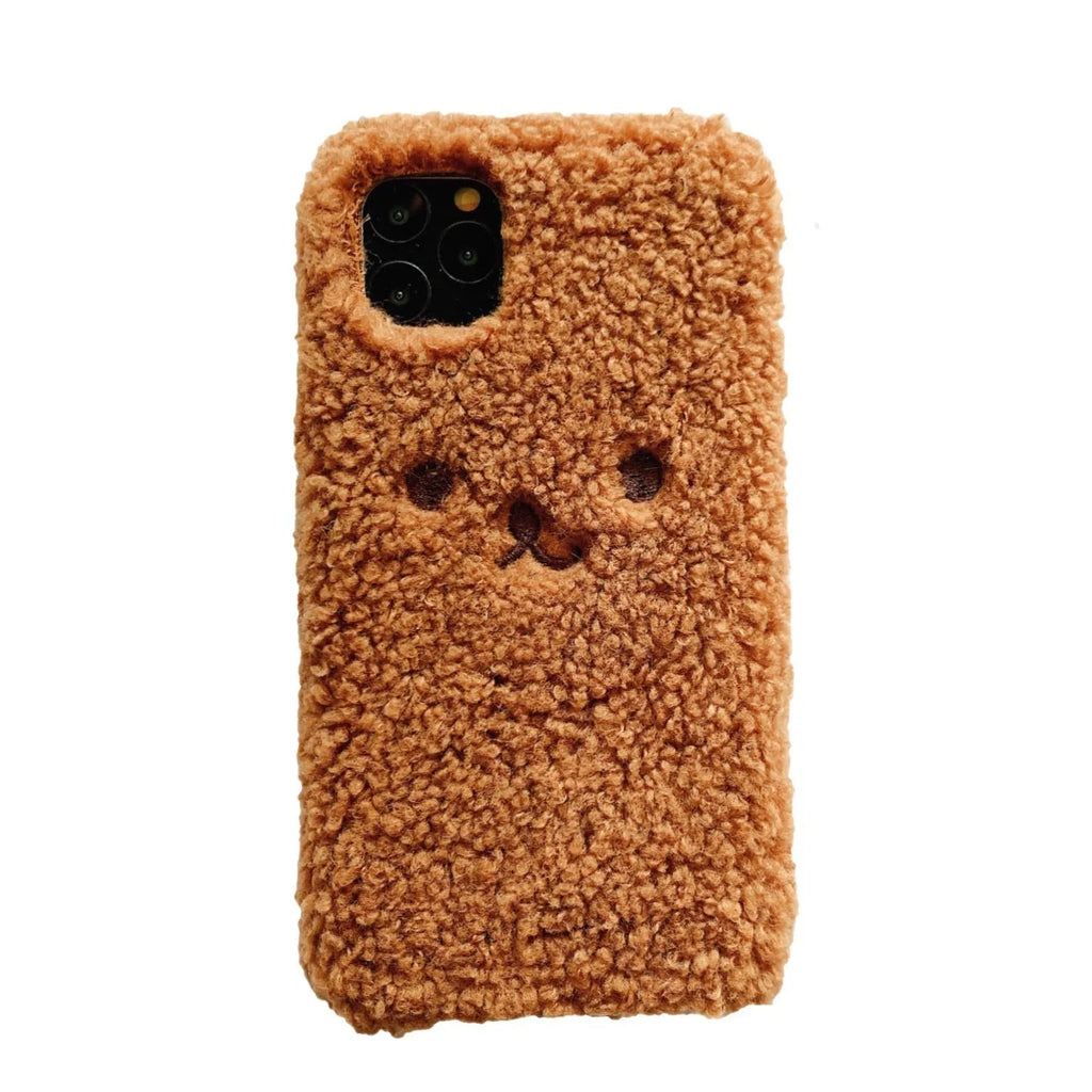 Brown embroidered plush cartoon bear face on a soft TPU iPhone case
