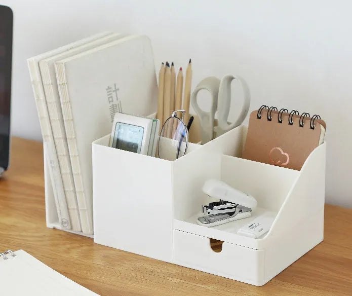 White plastic desktop bookend book stand holding books on a desk or shelf