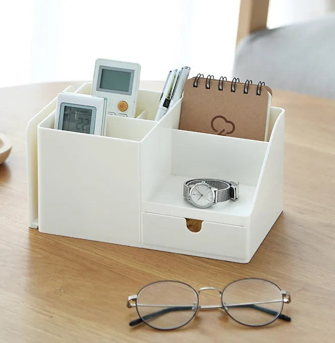 White plastic desktop bookend book stand holding books on a desk or shelf