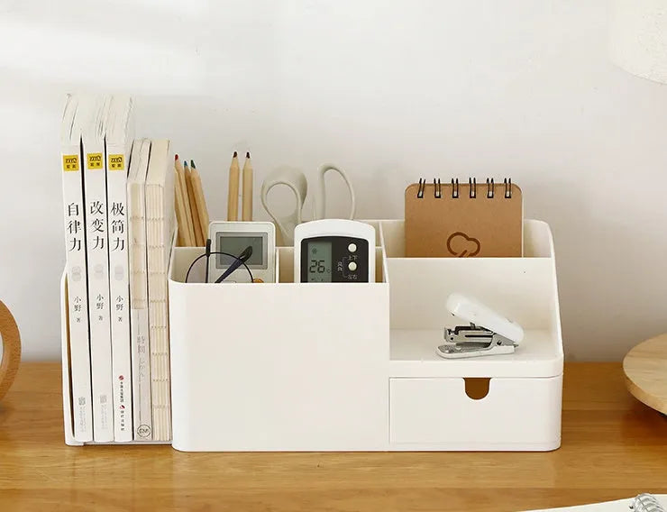 White plastic desktop bookend book stand holding books on a desk or shelf