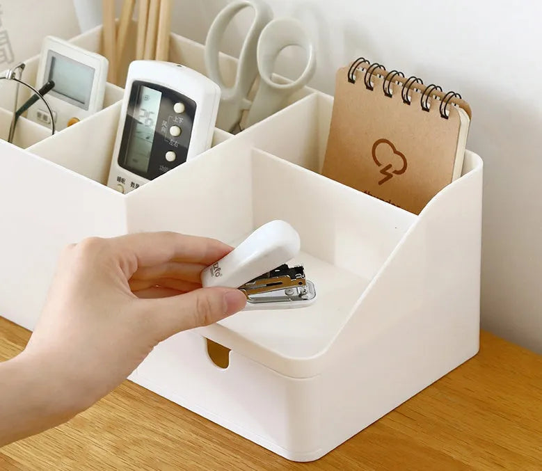 White plastic desktop bookend book stand holding books on a desk or shelf