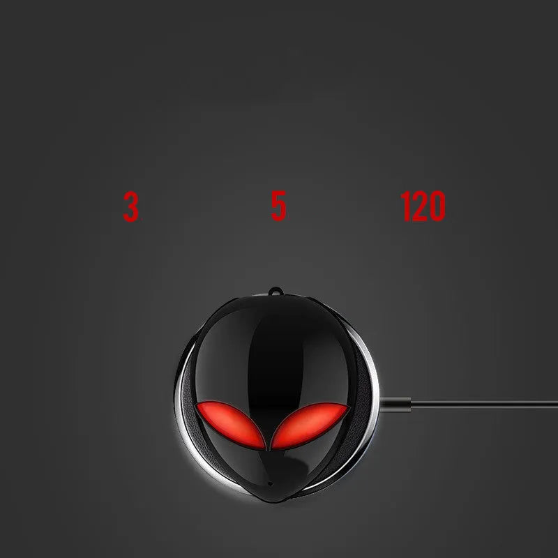 Creative Outer T8 Starman Alien design Bluetooth earbuds with red lighting in charging case.
