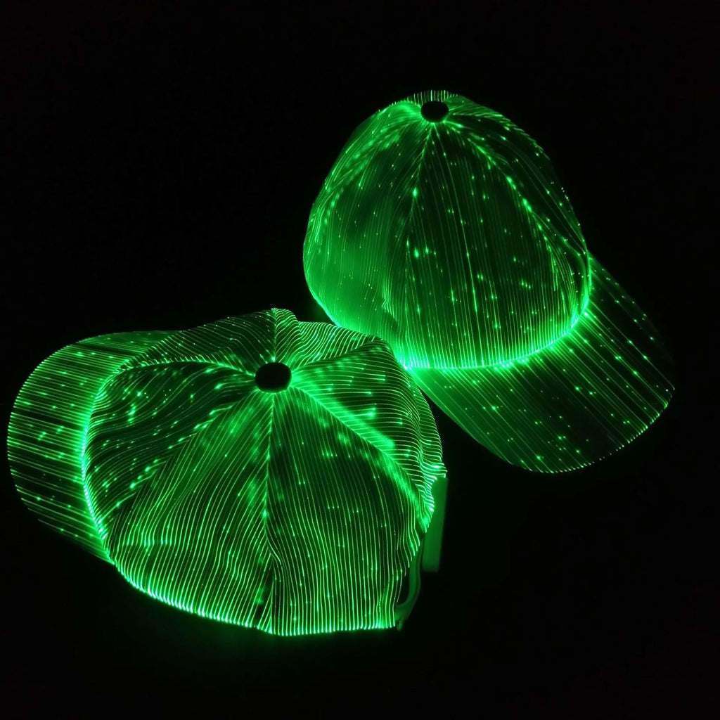 White luminous baseball cap with fibre optic fabric and LED glow against dark background