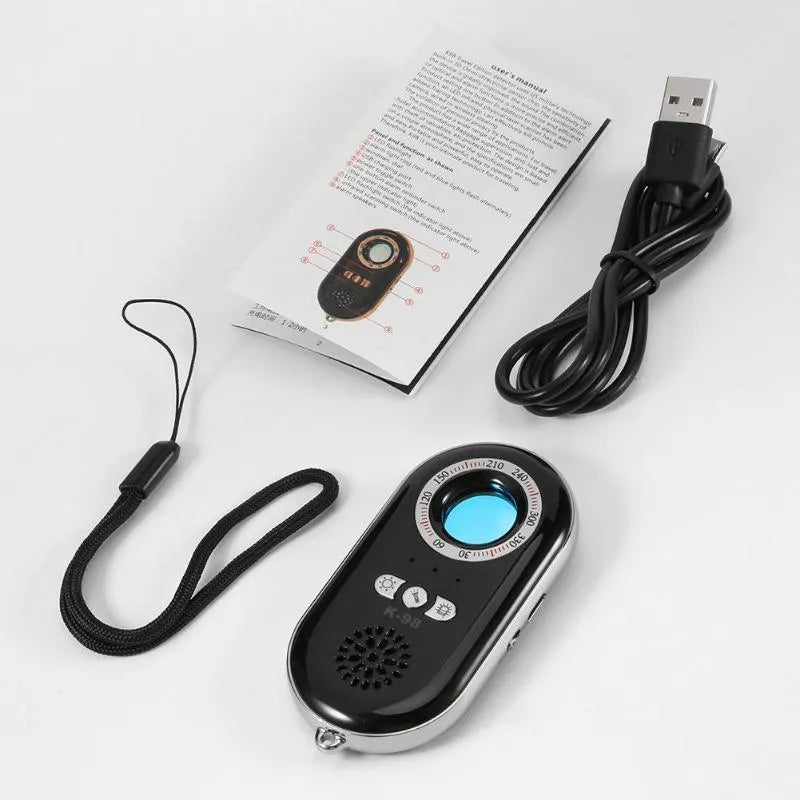 Compact black wireless signal detector with vibration alarm for travel security measuring 85mm