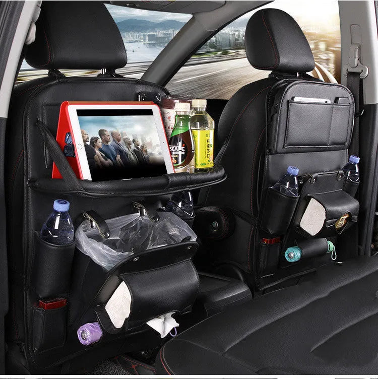 Black PU leather car seat back organiser with multiple pockets and a built-in trash can compartment