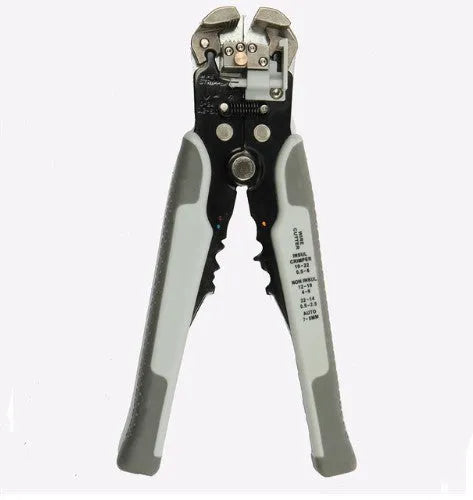 Yellow automatic 3-in-1 wire stripper, crimper, and cutter tool on a workbench.