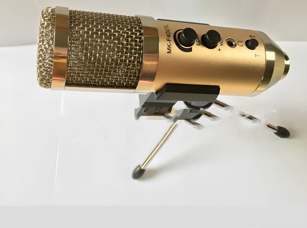 Gold condenser microphone with USB-C connection and mounting bracket for mobile phones and computers