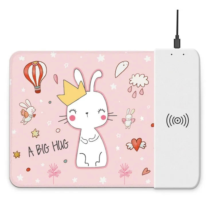 Cartoon design wireless charging mouse pad with RGB lighting on a desk