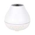 White round Bluetooth humidifier and aroma diffuser with night light and speaker