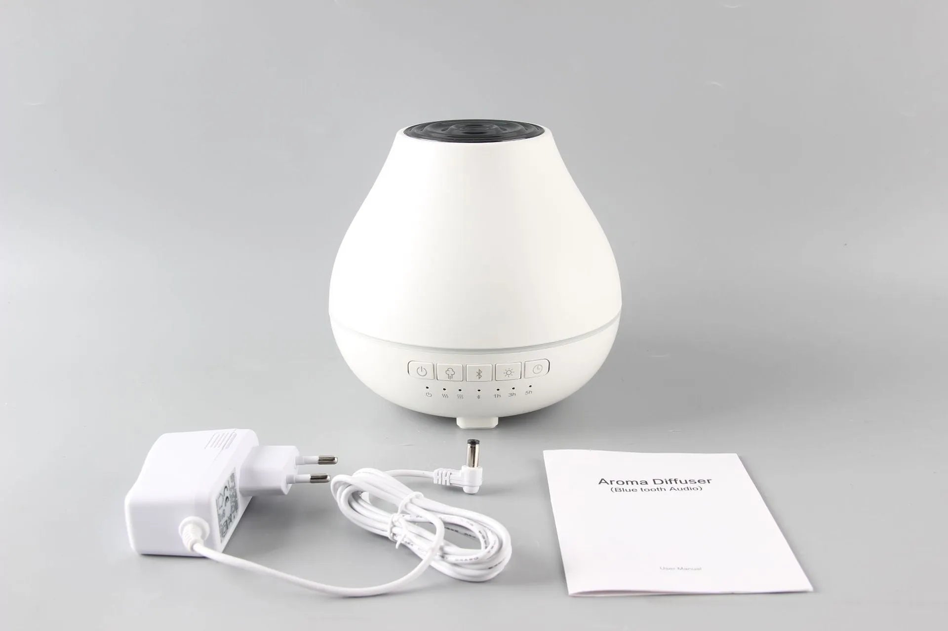 White round Bluetooth humidifier and aroma diffuser with night light and speaker