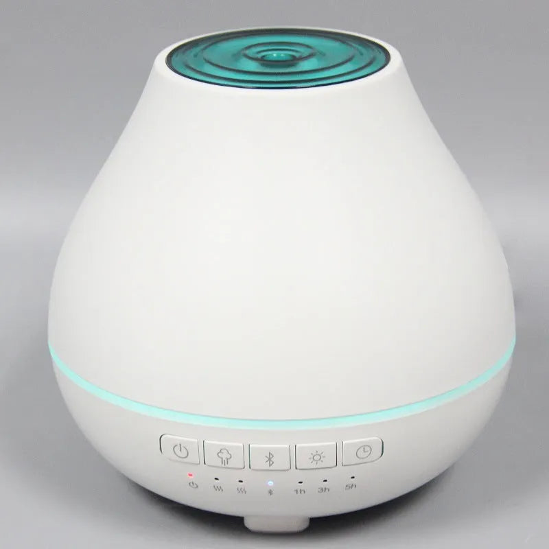 White round Bluetooth humidifier and aroma diffuser with night light and speaker