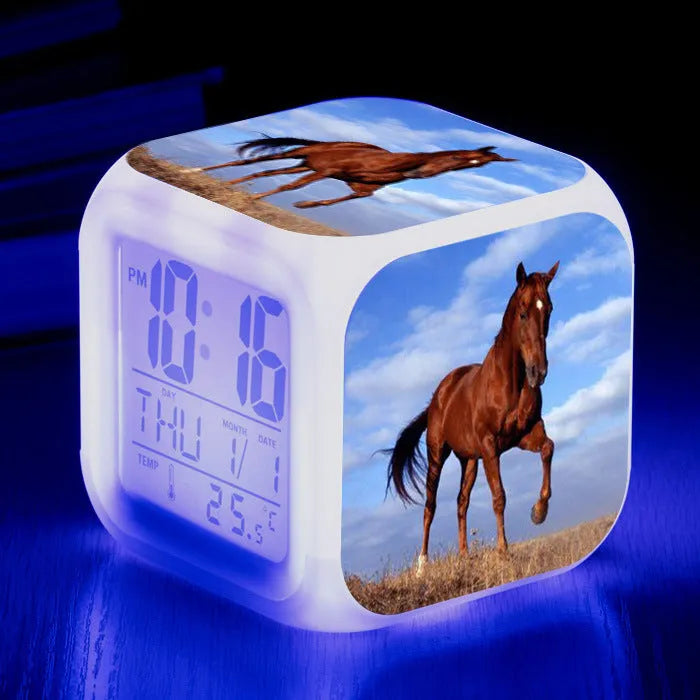 Square cartoon alarm clock with LED display showing time and temperature