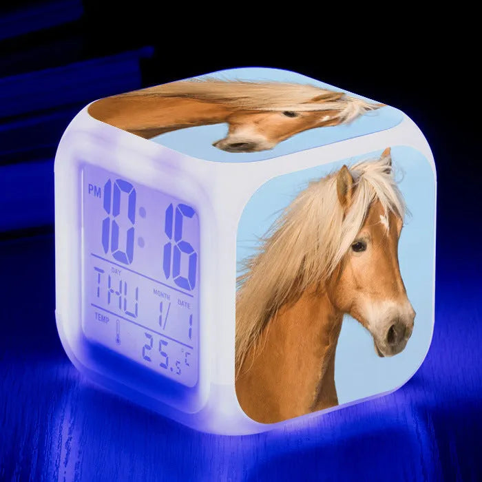 Square cartoon alarm clock with LED display showing time and temperature