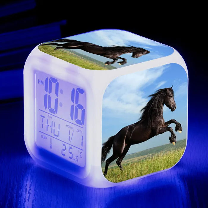 Square cartoon alarm clock with LED display showing time and temperature