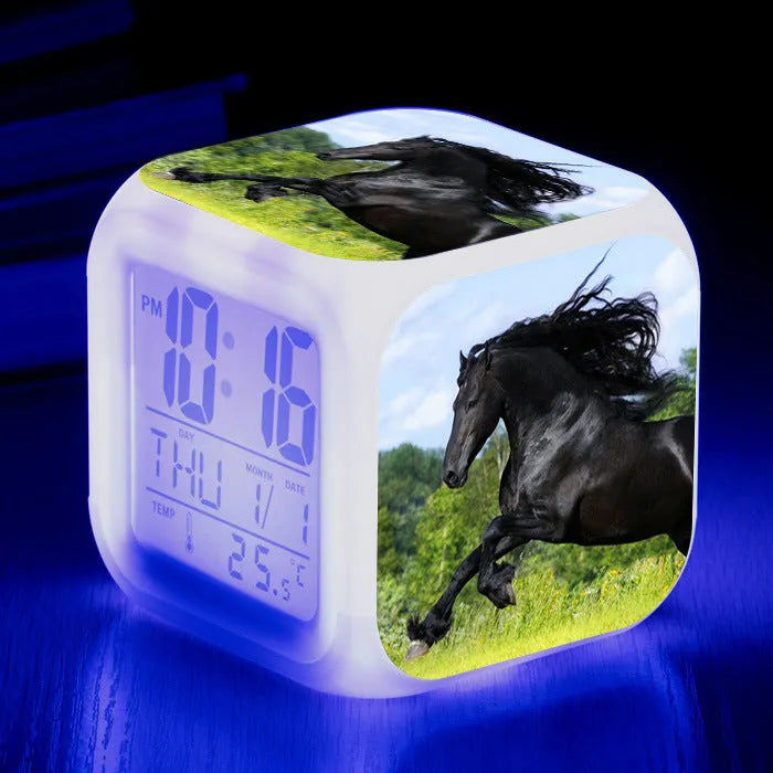 Square cartoon alarm clock with LED display showing time and temperature