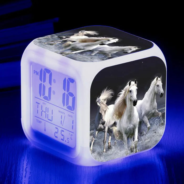 Square cartoon alarm clock with LED display showing time and temperature