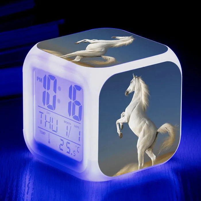 Square cartoon alarm clock with LED display showing time and temperature