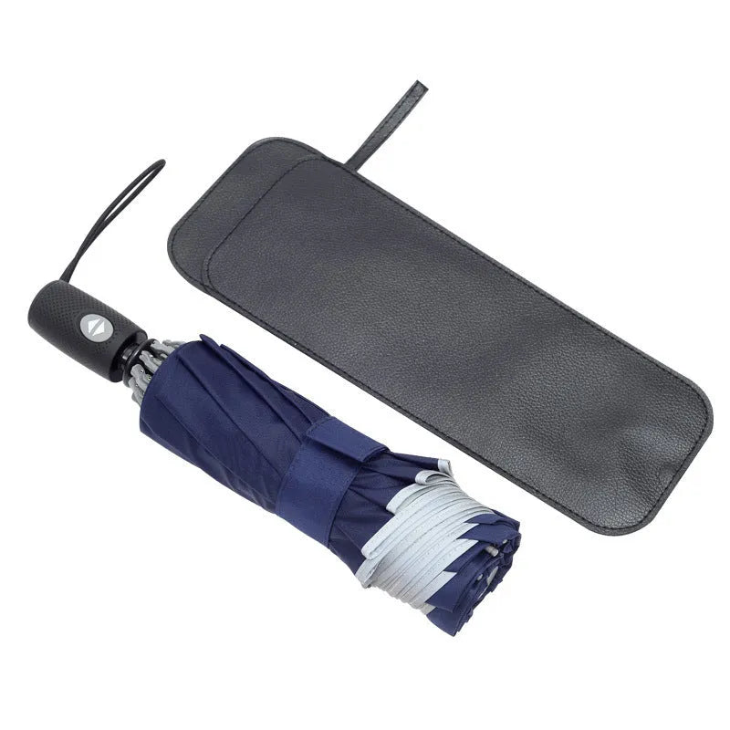 Automatic reverse folding umbrella with black canopy, plastic handle, shown open and closed.