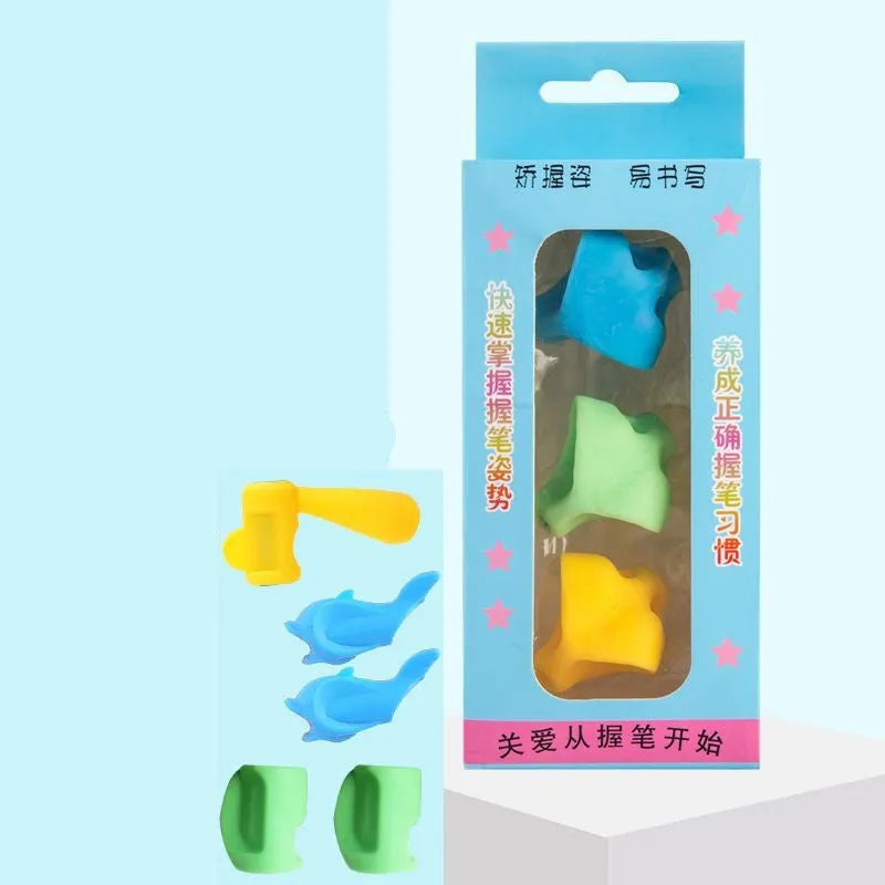 Dolphin-shaped pen holder orthosis for children in mixed colours, shown with a writing corrector.