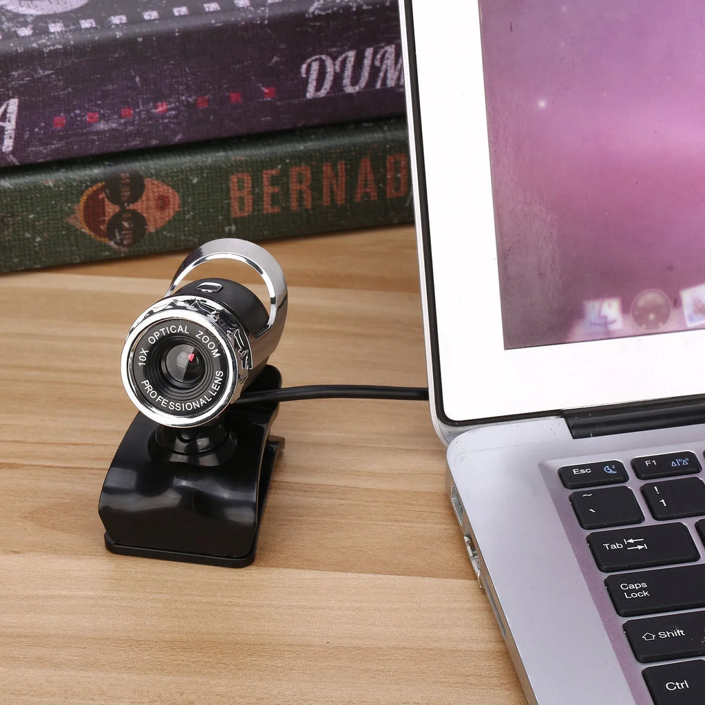 Black 5MP HD USB computer camera with night vision, manual focus lens, and built-in microphone on a notebook screen