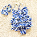 Navy style infant one-piece swimsuit with built-in steel support, pink colour with matching hair band, on a light background