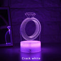 3D LED night light showing illuminated diamond ring design on a black background with colour-changing lights.