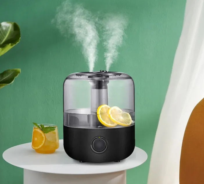 Black or white desktop humidifier with 3 litre capacity and compact design for bedroom use