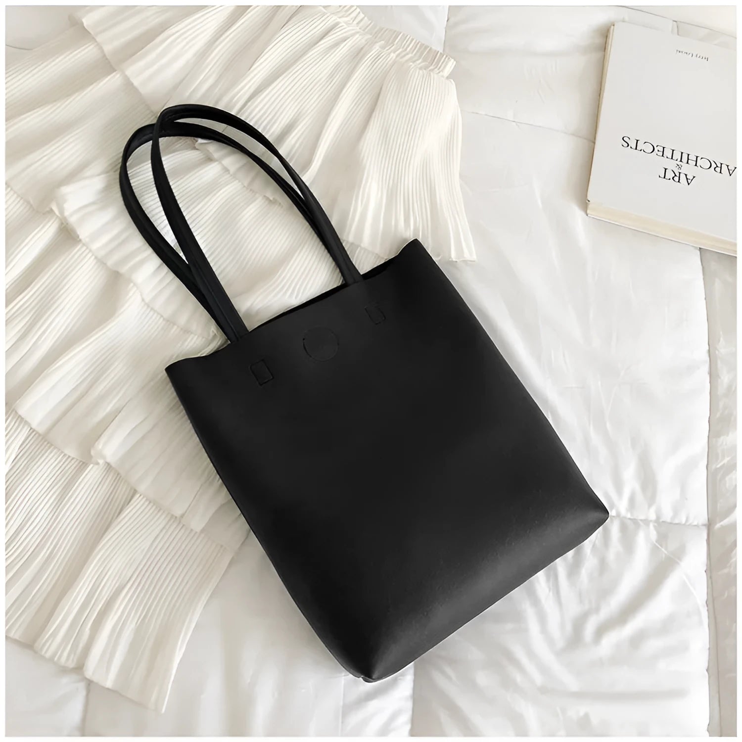 Large-capacity portable tote bag in Black with plain car suture design, soft handle, and single shoulder strap