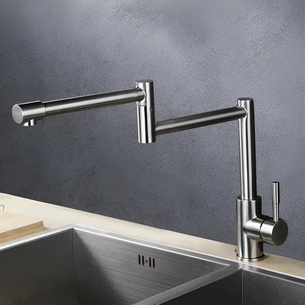 Silver stainless steel kitchen or bathroom mixer tap with a 360-degree rotating spout.