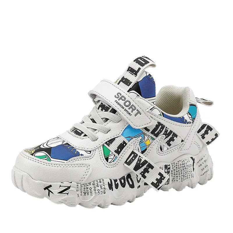 Kids blue and beige Velcro sports sneakers with rubber sole shown from side