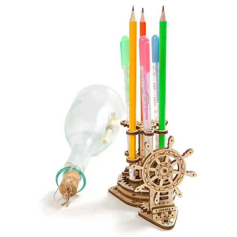 Wooden rotating pen holder with steering wheel mechanism showing photo colour finish on machinery model