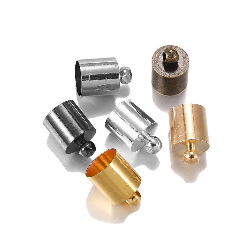 Assorted copper caps for jewellery making in gold, silver, bronze and black finishes, showing size variation.