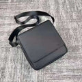 Men's leather horizontal square backpack in black with cover opening and internal organiser pockets