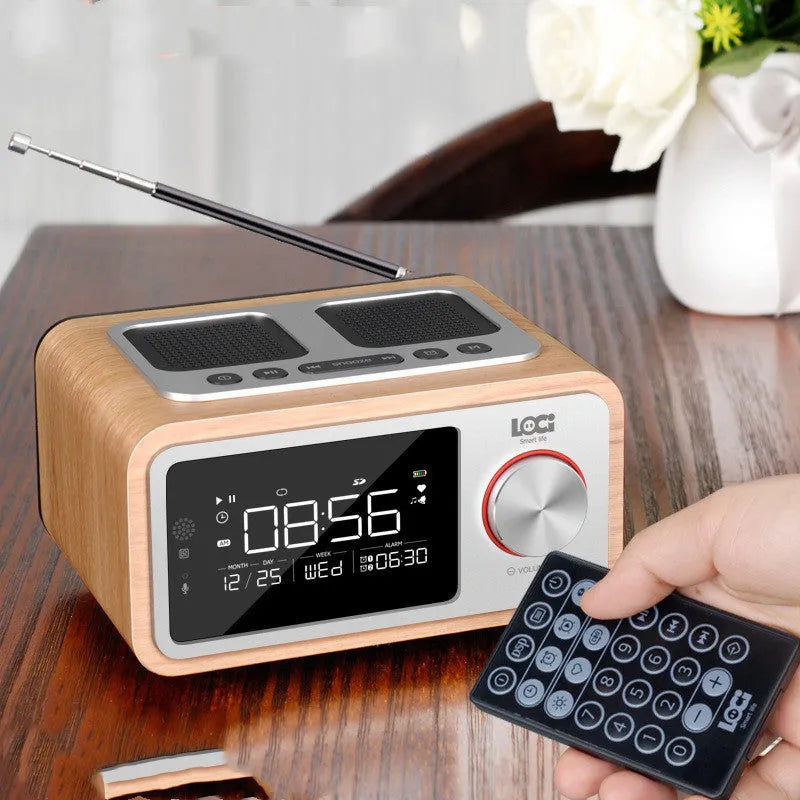 Compact wooden Bluetooth speaker alarm clock radio in golden oil colour with dual drivers and USB charge port