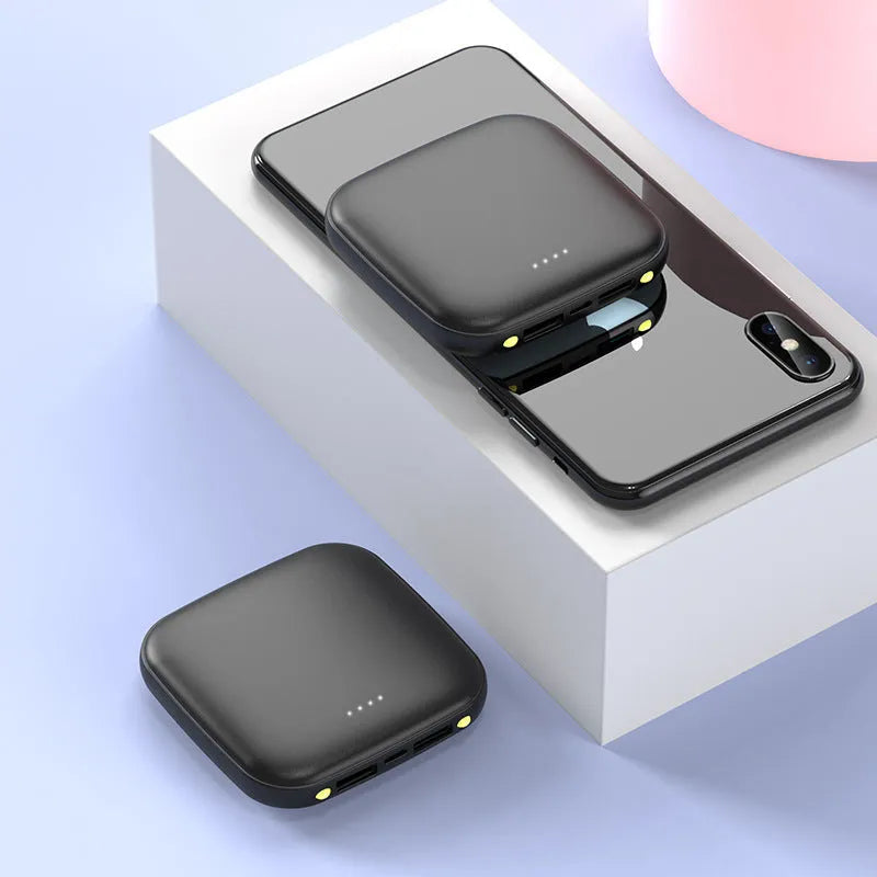 Compact black 20000mAh power bank with LED flashlight, showing dimensions of 82mm.