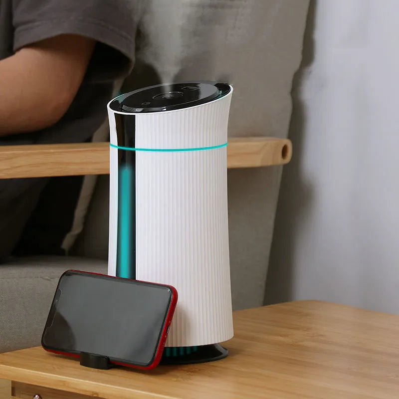 White cylindrical USB humidifier with single fog outlet and water tank for small rooms up to 20 square metres
