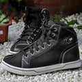 Black and grey men's summer motorcycle casual short boots on a plain background.