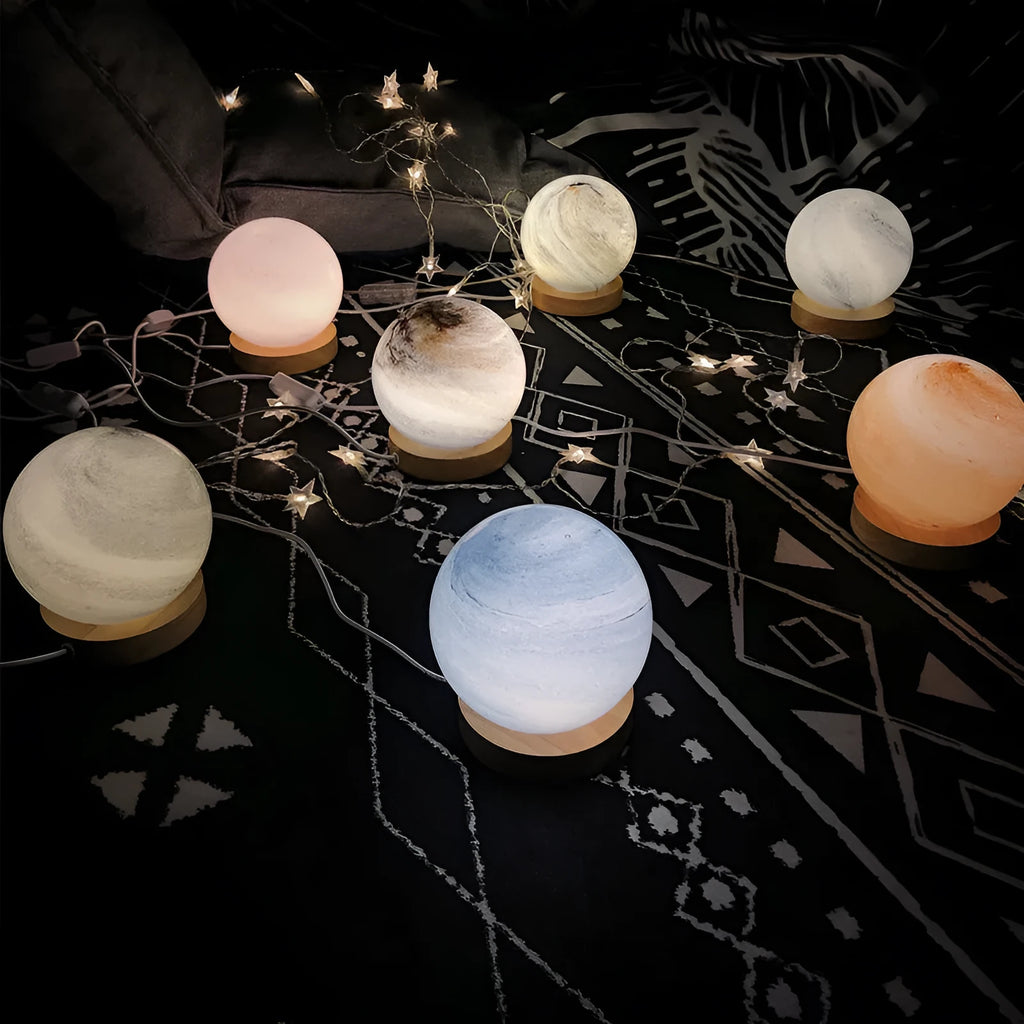 Nordic style USB-powered bedside table lamp with a glass shade, shown in one of seven available colours.