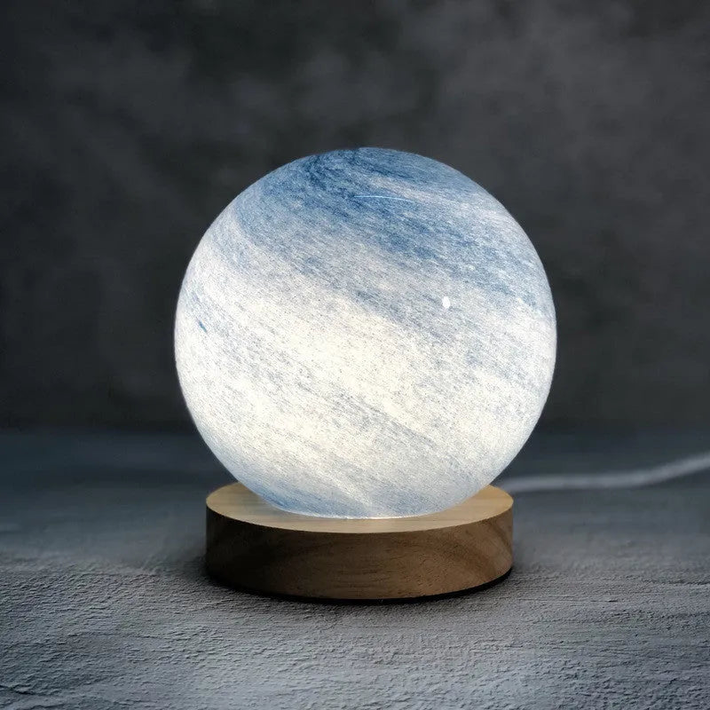 Nordic style USB-powered bedside table lamp with a glass shade, shown in one of seven available colours.