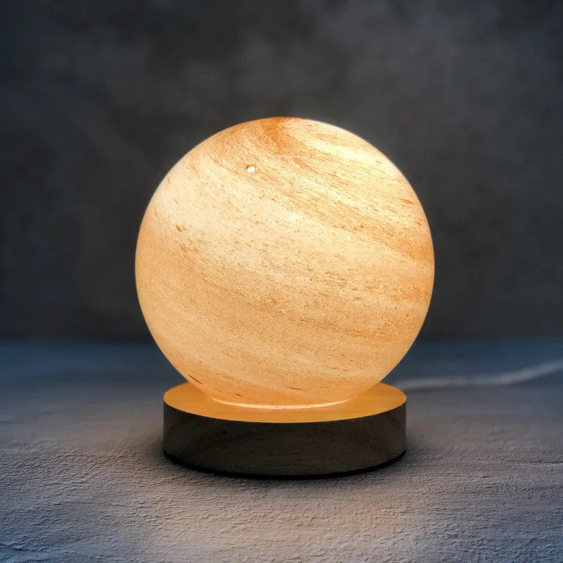 Nordic style USB-powered bedside table lamp with a glass shade, shown in one of seven available colours.