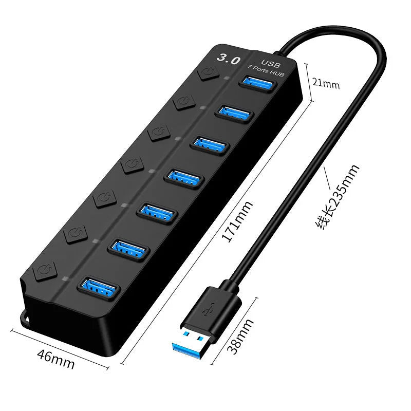 Black 7-port high-speed USB 3.0 hub with external power adapter on a desk.