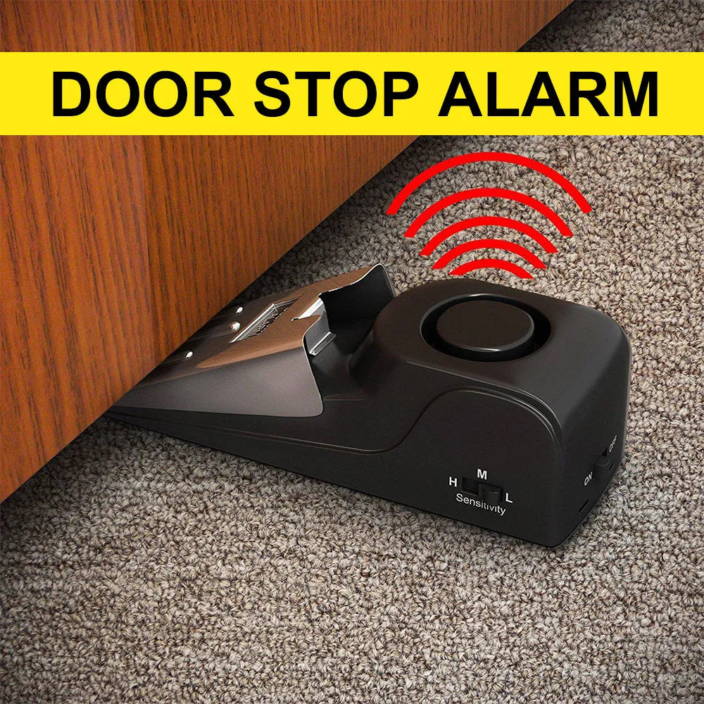 Electronic burglar alarm wedge door stop with ABS housing and 150dB siren on white background