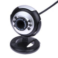 USB webcam with six white LED lights around the lens and a manual focus ring.