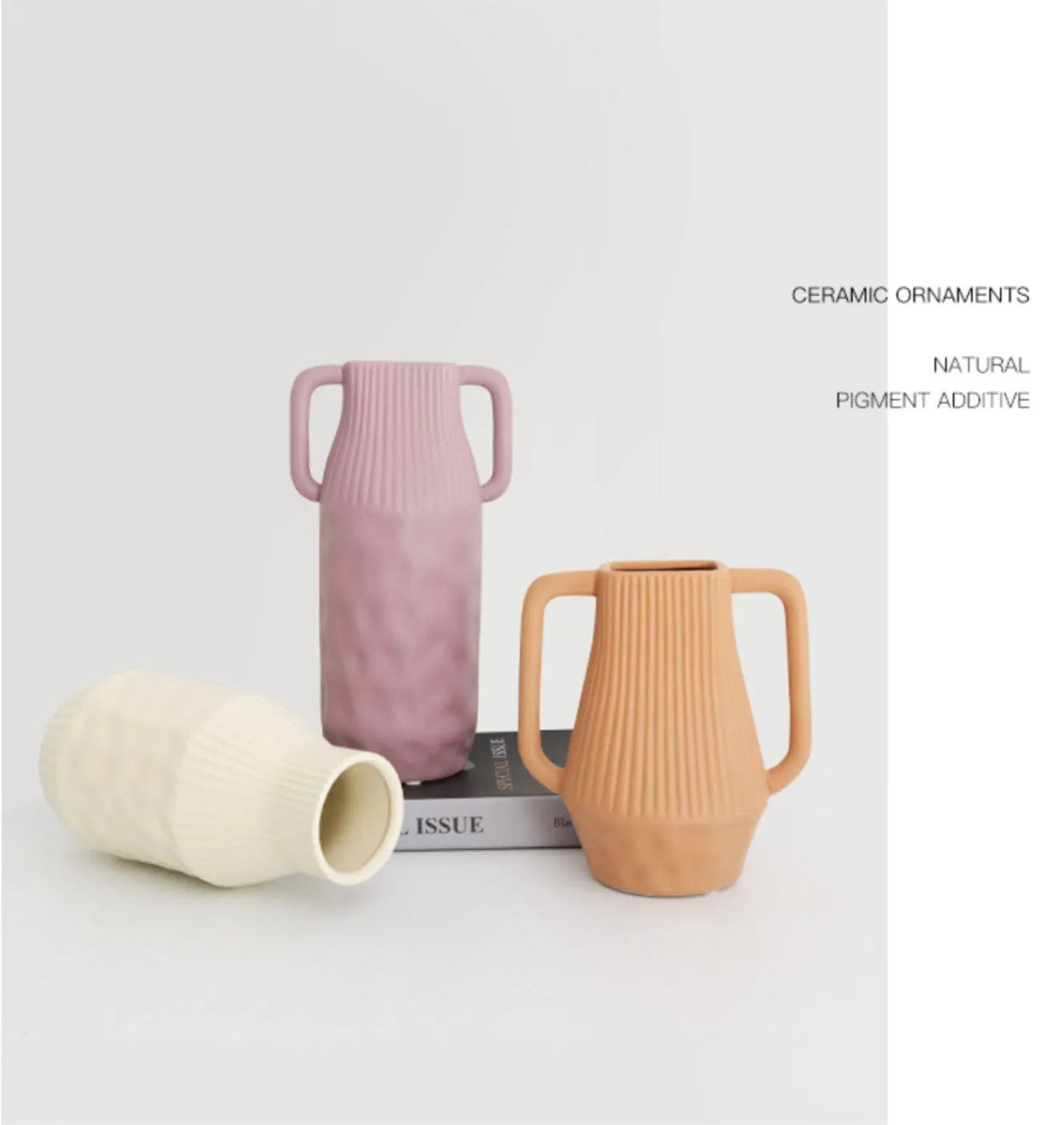 Nordic style Morandi ceramic vase with colour glaze in beige, brown, or purple on a wooden surface.